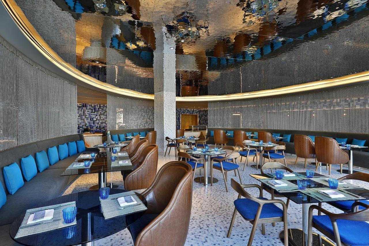 فندق دبليو مسقط المظهر الخارجي الصورة The interior of the restaurant