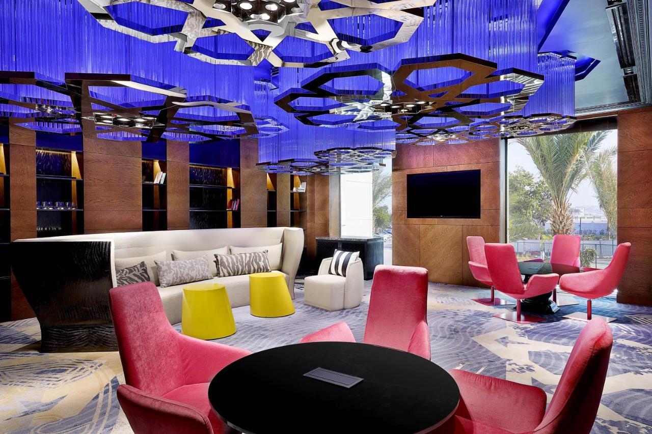 فندق دبليو مسقط المظهر الخارجي الصورة The W lounge at Beijing Capital International Airport