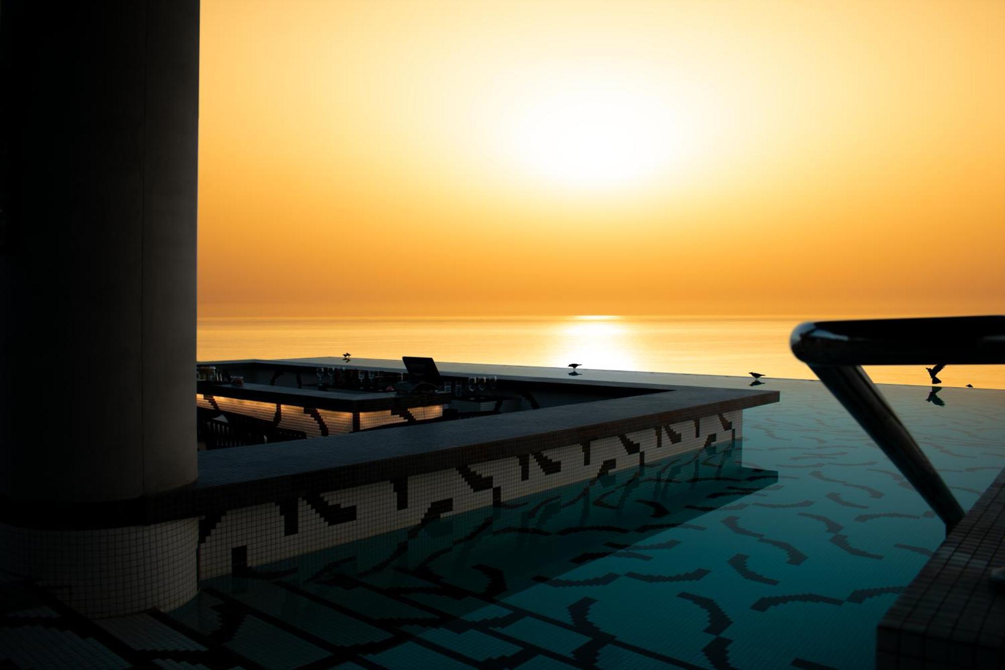 فندق دبليو مسقط المظهر الخارجي الصورة Sunset at the Dead Sea